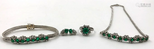 Set. White - 750 gold. Emeralds. Diamonds.