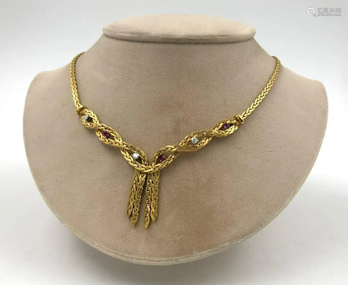 Gold 750 necklace with diamonds and rubies.