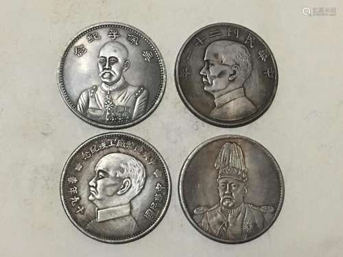 Four Chinese Coins