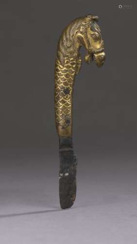 INDIA 18th century Gilt bronze butter knife, the h…