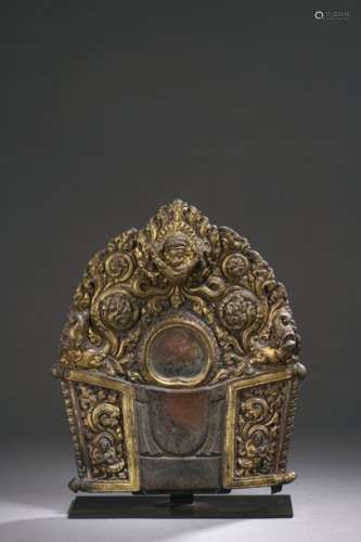 NEPAL 17th century Gilt copper mandorla with openw…