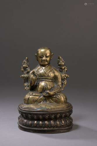 TIBET 15th century Brass statuette of a lama sitti…