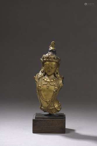 TIBET 18th century Gilt bronze Buddha bust, the he…