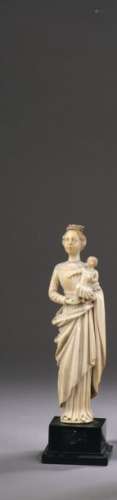 VIRGIN TO THE CHILD out of ivory carved in round b…