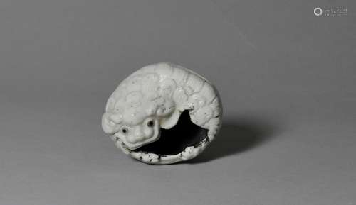 A White-Glazed 'Lion' Washer, Qianlong Period
清乾隆 狮子滚绣球白瓷水盂