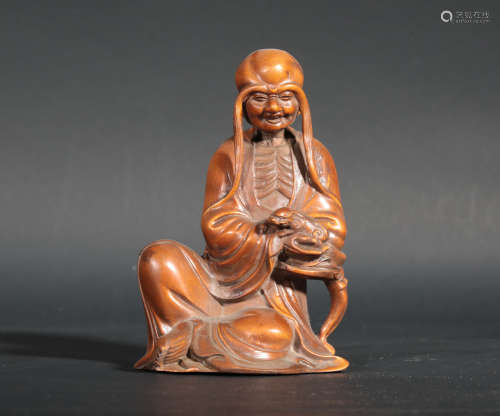 A Carved Huangyang Seated Arhat Qing Dynasty