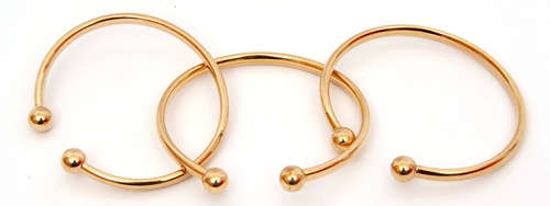 Three 9ct gold torque bangles, plain polished design, 17gms