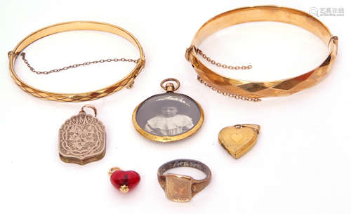 Mixed Lot: two rolled gold hinged bracelets, two heart pendants, a double sided photo locket, a gilt