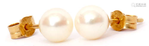 Pair of cultured pearl stud earrings in 750 stamped post mounts and fittings