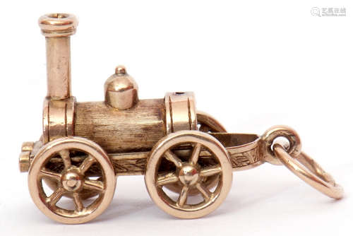 Small yellow metal Stephenson Rocket pendant charm