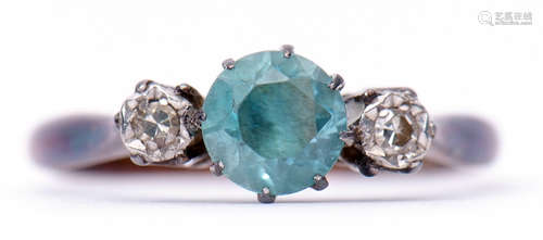 Blue zircon and diamond ring, a centre stone set between two small single cut diamonds, stamped