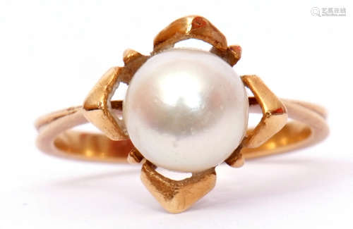 Yellow metal and cultured pearl dress ring, the pearl raised and set between four petals to a