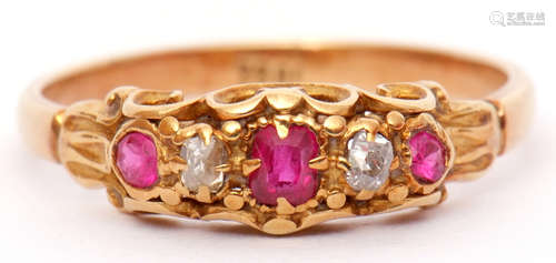 Antique ruby and diamond ring set with 3 graduated rubies and 2 old cut diamonds, all in a carved