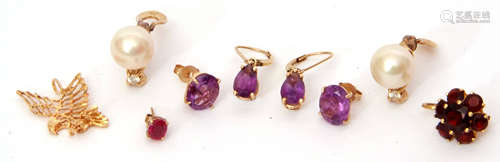 Mixed Lot: two pairs of 14K stamped amethyst earrings, a single garnet cluster earring in a 750