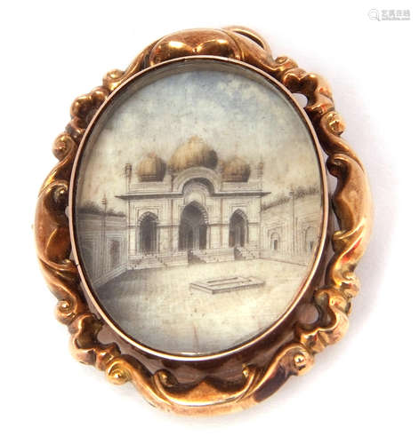 Antique double sided glazed oval pendant brooch, one side depicting an Indian temple, the verso a