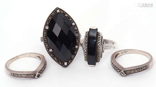 Mixed Lot: four 925 stamped rings, two with black onyx panels, highlighted with marcasite,