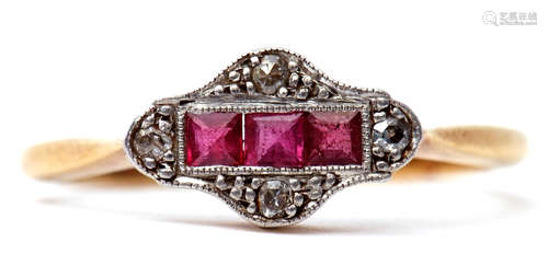 Ruby and diamond ring, the centre featuring a line of three calibre cut rubies, framed in a