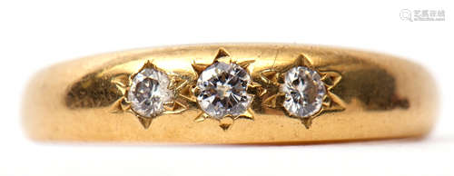 18ct gold and three stone diamond ring, featuring three small graduated brilliant cut diamonds, each