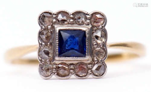 Art Deco sapphire and diamond cluster ring, the square cut cushion shape sapphire raised within a