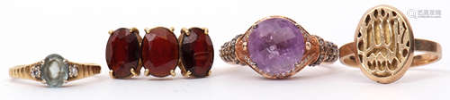 Mixed Lot: modern amethyst and diamond dress ring, stamped 14K, a modern 750 stamped three stone