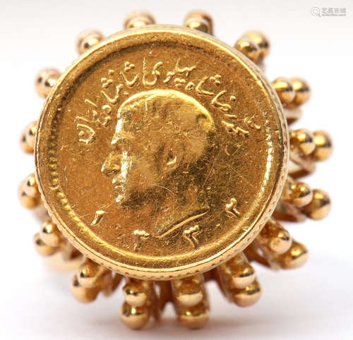 Iran gold half Pahlavi coin ring, the coin set in an ornate pierced bead basket mount to a split