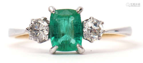 Diamond and emerald three stone ring, rectangular cut emerald flanked by two brilliant cut diamonds,