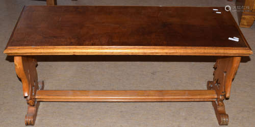 Modern coffee table with eagle finial stretcher, 110cm wide