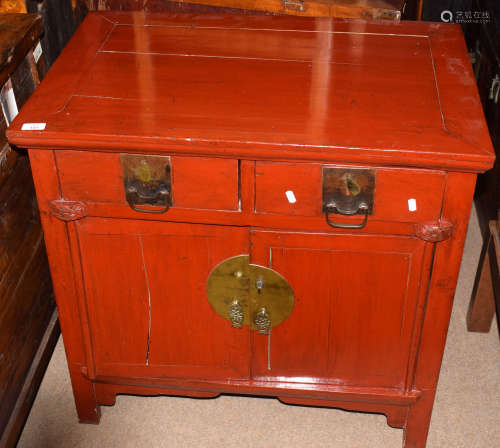 20th century Chinese style hardwood cupboard, two drawers over two doors, painted red, 81cm wide x
