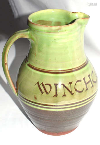 Winchcombe Pottery jug with green slip decoration dated Winchcombe 1950 by Ray Finch, impressed