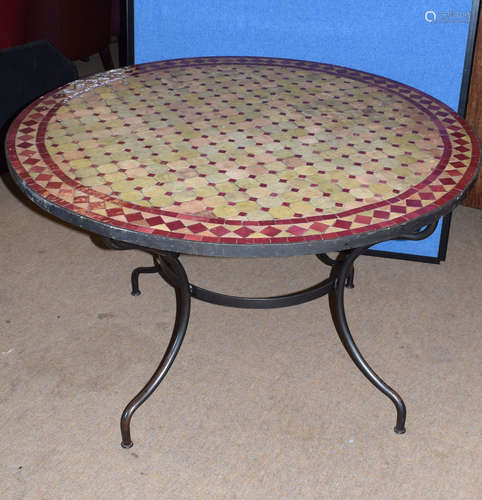 Modern Spanish mosaic tile top circular table on iron splayed feet, 120cm diam