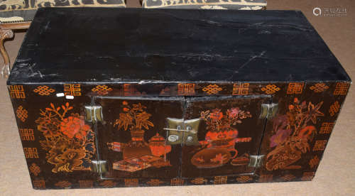 Modern Oriental cupboard in the form of a trunk with Chinese decoration to front panel and doors,