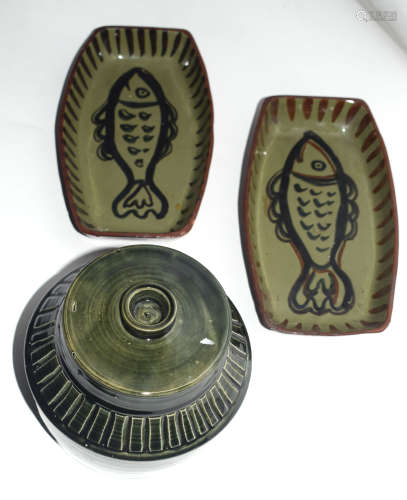 Two Southwold Studio pottery dishes, the interior painted with fish, 19cm long (2)