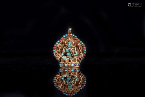 Arte Himalayana A Rana style gold plated pendant portraying Green Tara encrusted with coral, turquo