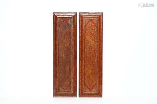 Arte Himalayana A pair of red lacquered book covers painted with gilded floral motif China, Qing dy