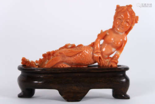 Ancient Chinese sculpture in red coral : \