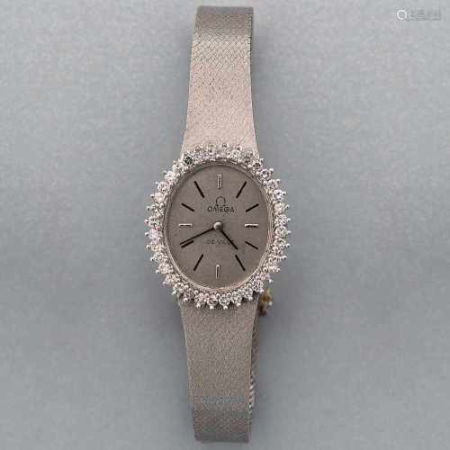 Reloj Joya de señora marca Omega en caja oval con orla de blancos y limpios brillantes