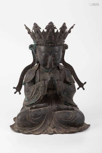 A COPPER FIGURE OF A BUDDHA