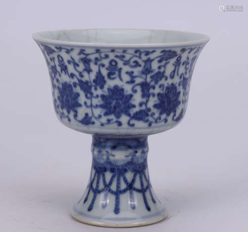 A BLUE AND WHITE FLORALS EIGHT TREASURES CUP WITH HIGH FOOT QING DYNASTY QIANLONG PERIOD