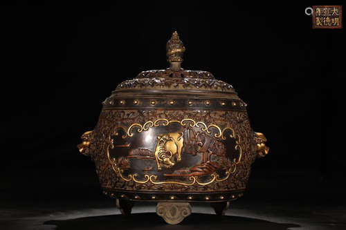 A FINE BRONZE GILT BOY RING COW CENSER