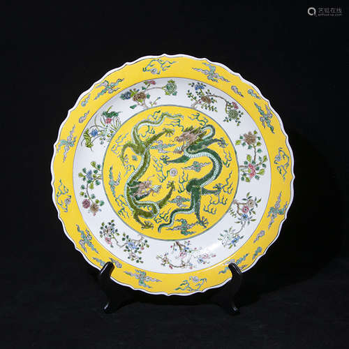 A FAMILLE ROSE YELLOW GLAZED DOUBLE-DRAGONS PLATE