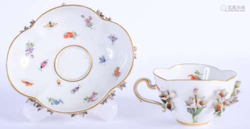 A 19TH CENTURY MEISSEN PORCELAIN CUP AND SAUCER painted