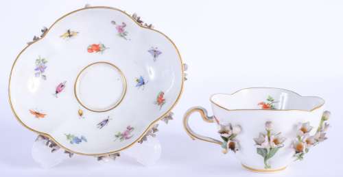 A 19TH CENTURY MEISSEN PORCELAIN CUP AND SAUCER painted