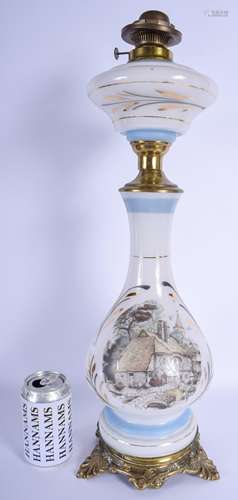 A VINTAGE OPALINE GLASS OIL LAMP decorated with