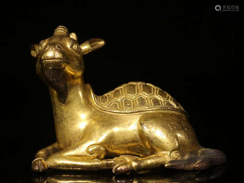 GILT BRONZE CAST 'MYTHICAL BEAST' RECUMBENT FIGURE