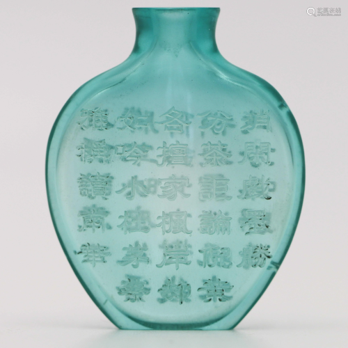 A CHINESE GREEN INSCRIBED GLASS SNUFF …