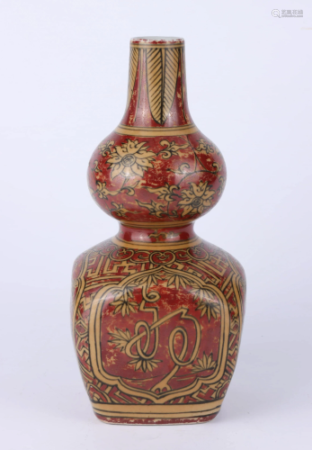 A CHINESE IRON RED GLAZED DOUBLE GO…