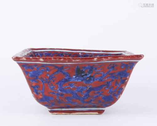 A CHINESE BLUE LAND RED GLAZED DRAG…