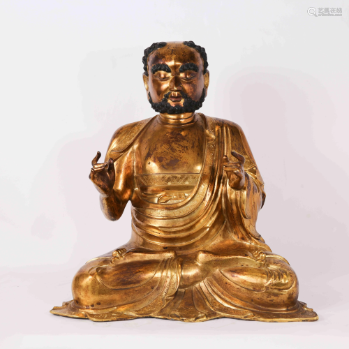 A CHINESE BRONZE GILD…