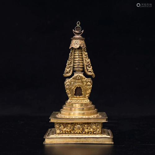 A CHINESE GILDED BRON…