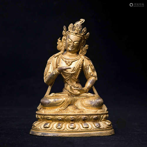 A CHINESE GILDED BRON…